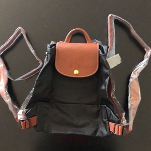 Longchamp backpack, black w/brown straps brand new